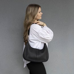 Laukku mallilla olalla