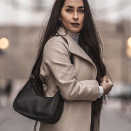 Laukku mallilla olalla